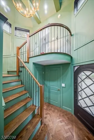 a large kitchen with stainless steel appliances granite countertop a large counter top and a stove