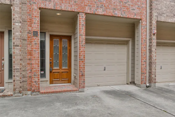 an entrance view of a house with an empty space