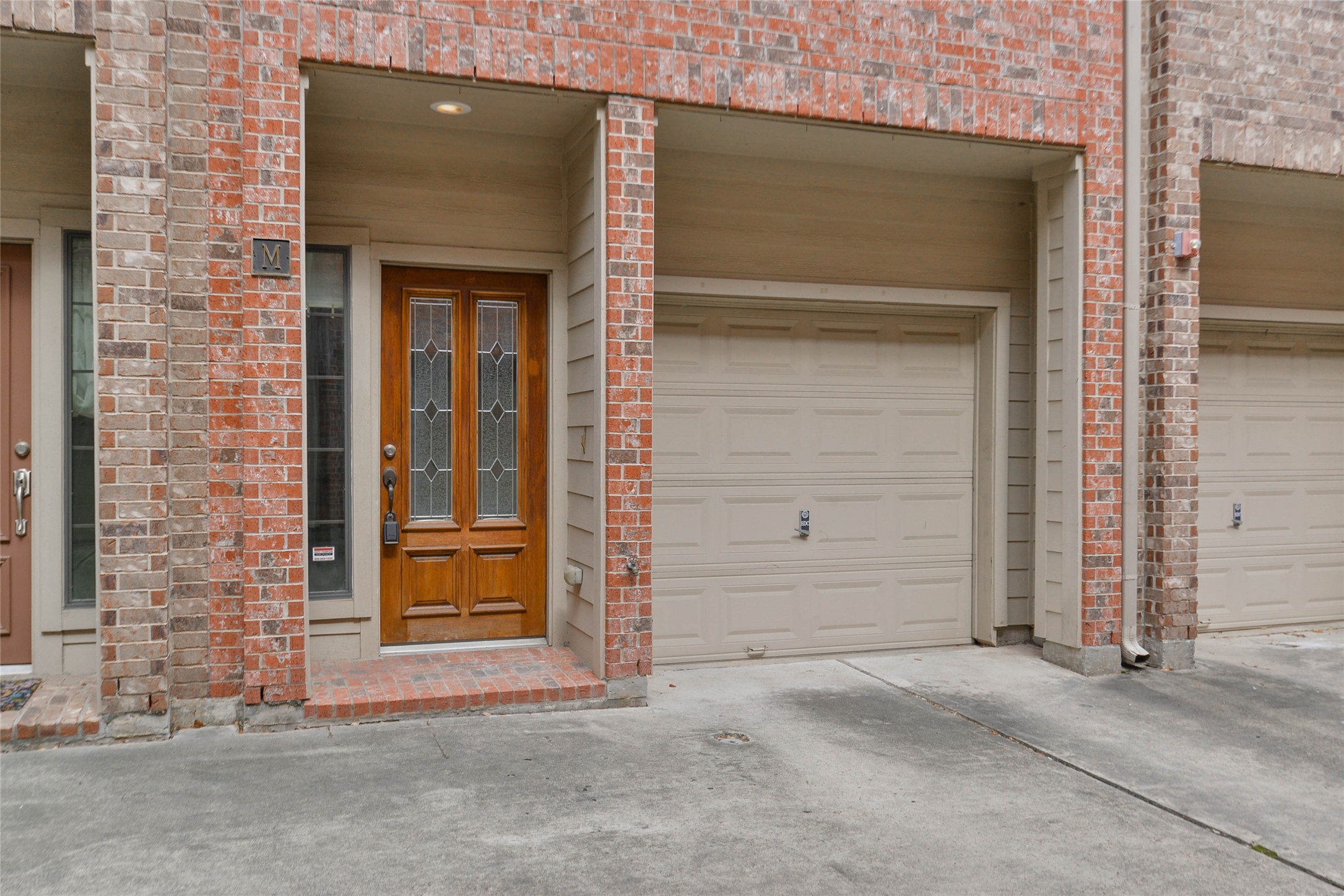 an entrance view of a house with an empty space