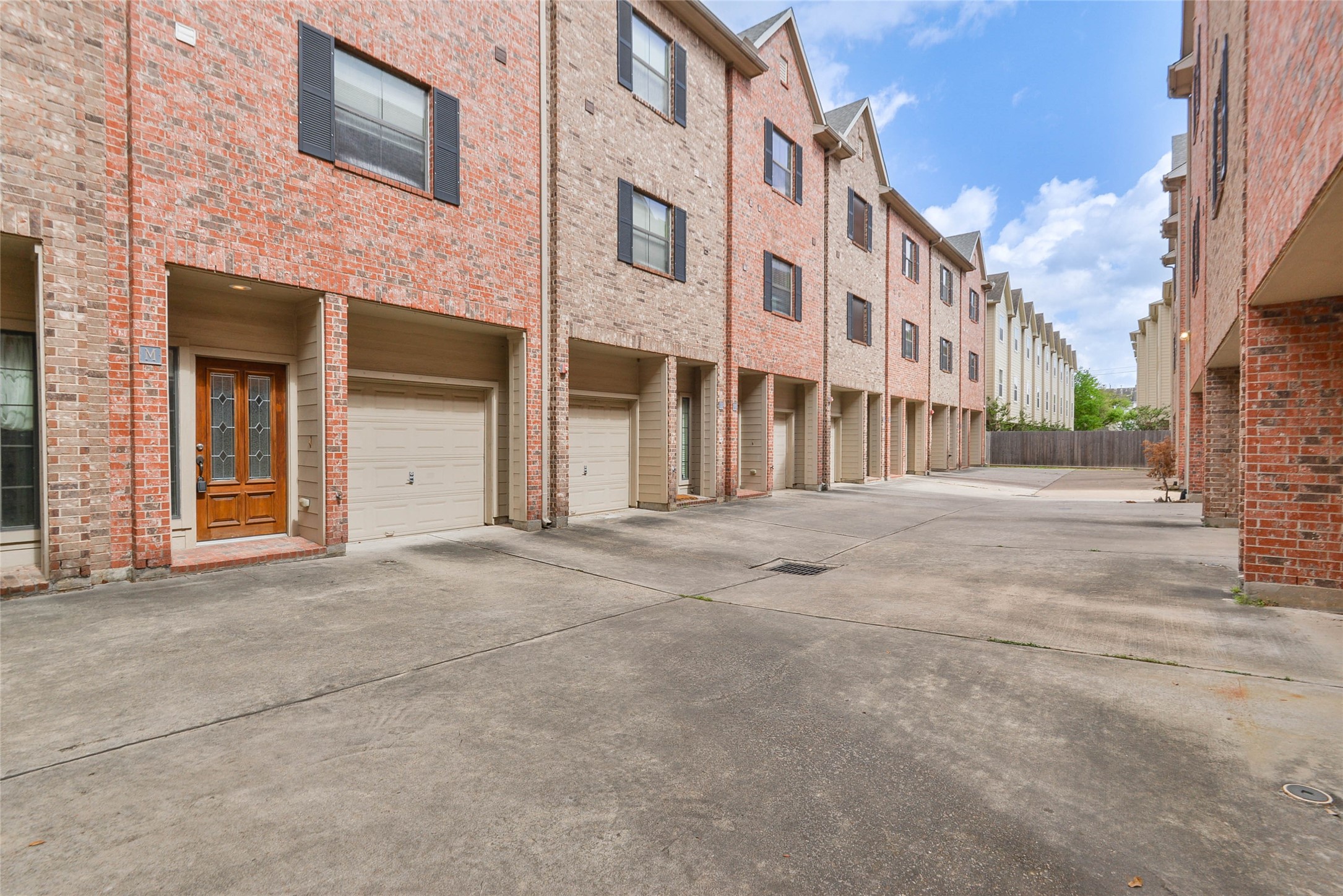 2904 Chenevert Street, Unit M Houston, TX 77004 - Photo 6 of 15 a view of a building with many windows