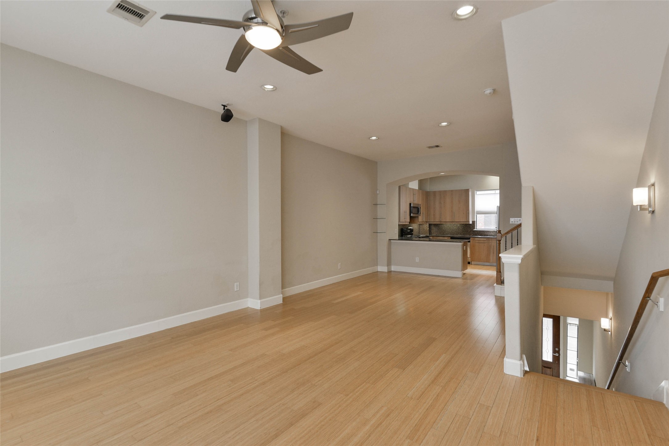 2904 Chenevert Street, Unit M Houston, TX 77004 - Photo 7 of 15 a view of empty room with wooden floor