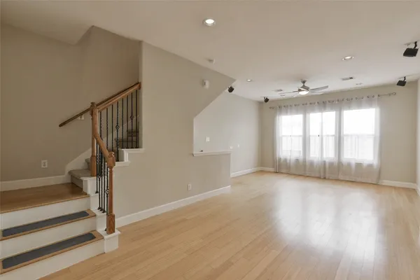 a bathroom with a shower and a sink