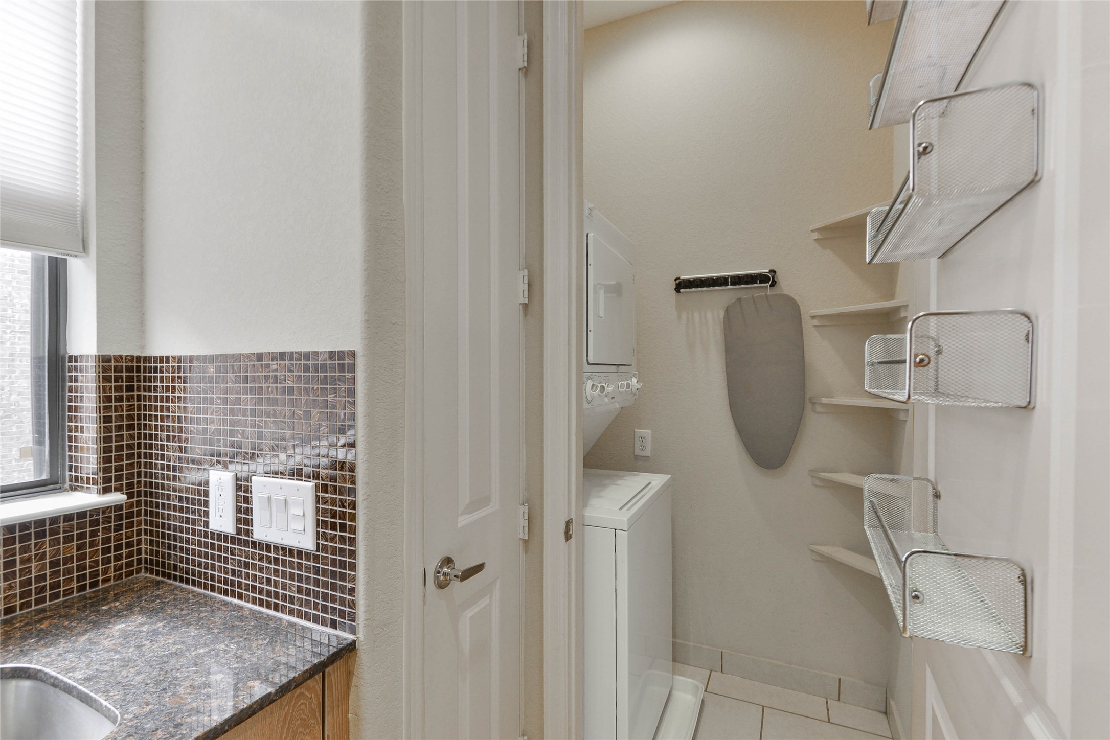 2904 Chenevert Street, Unit M Houston, TX 77004 - Photo 9 of 15 a bathroom with a shower and a sink