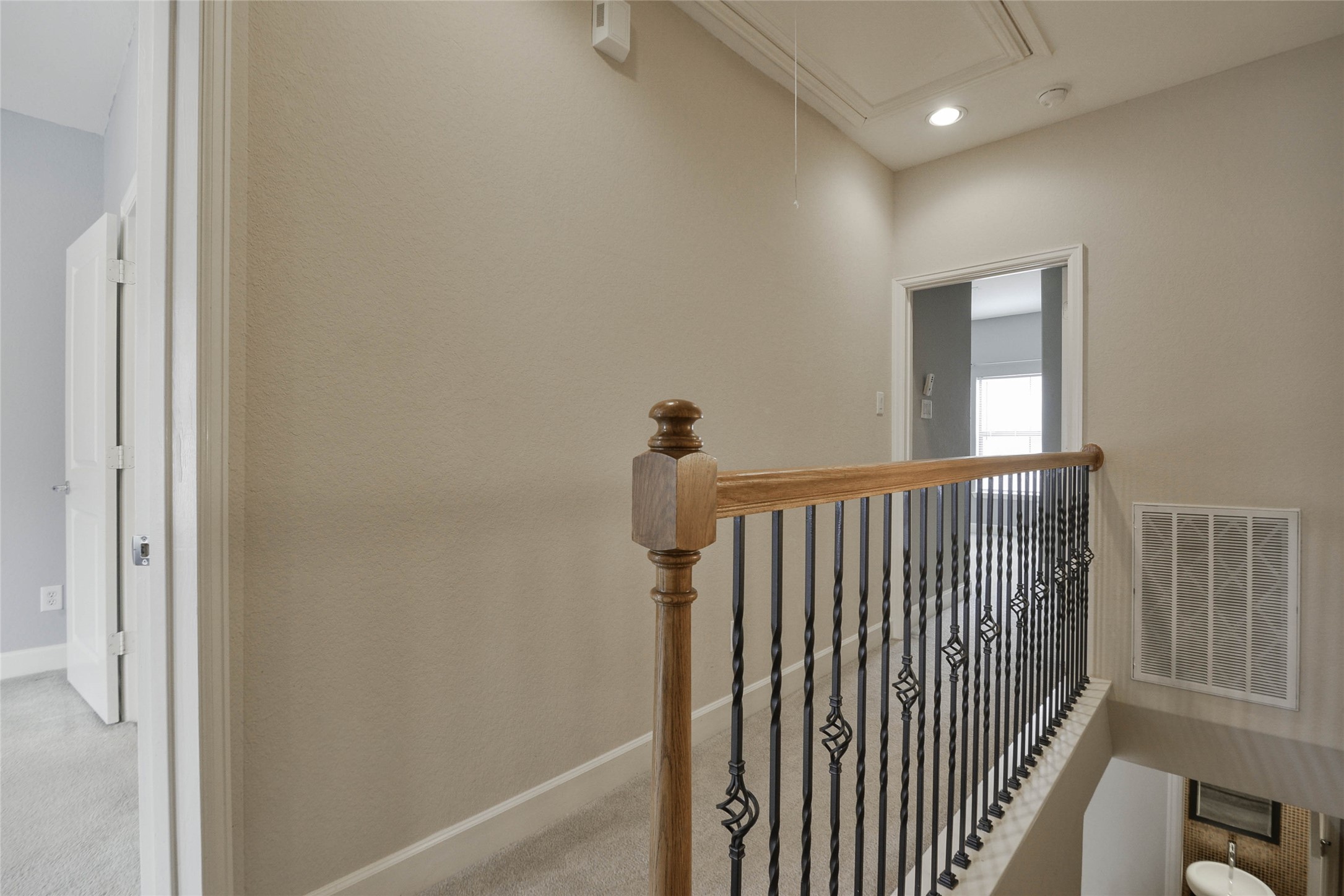 2904 Chenevert Street, Unit M Houston, TX 77004 - Photo 10 of 15 a view of a hallway with a window
