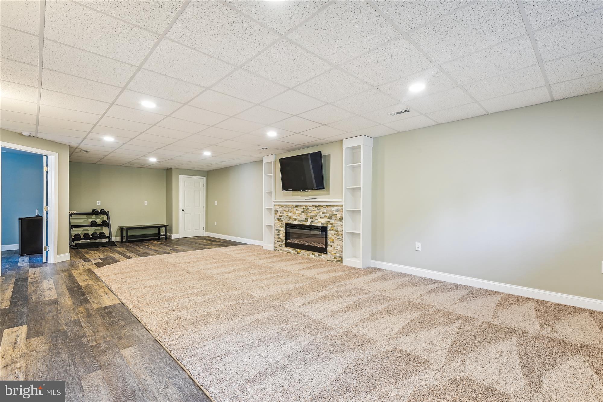 7819 Redwood Tree Road Severn, MD 21144 - Photo 22 of 41 Beautiful stone fireplace