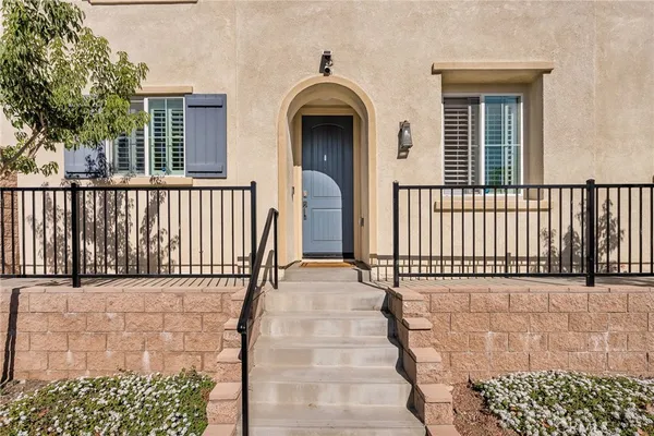 a view of a entrance gate of a house
