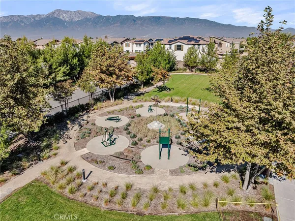 a view of a backyard of the house