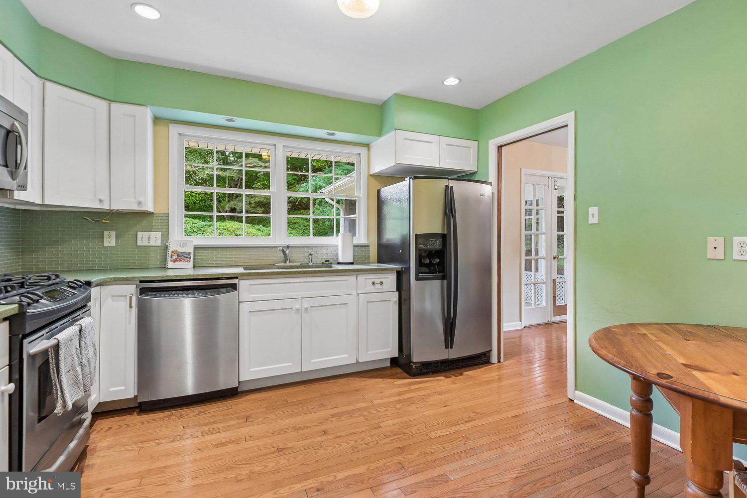 1518 Winchester Road Annapolis, MD 21409 - Photo 18 of 70 a kitchen with stainless steel appliances granite countertop a refrigerator sink and stove