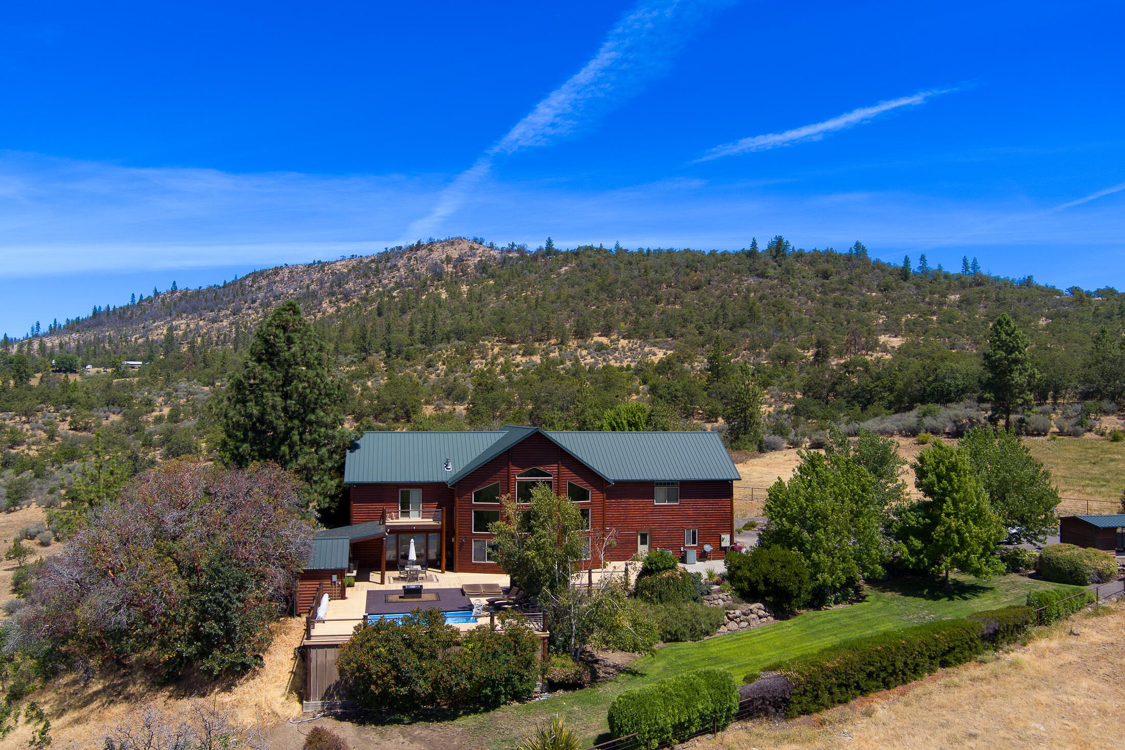 1881 Brophy Road Eagle Point, OR 97524 - Photo 5 of 130 a view of a house with a yard