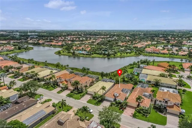 an aerial view of a city with lake view