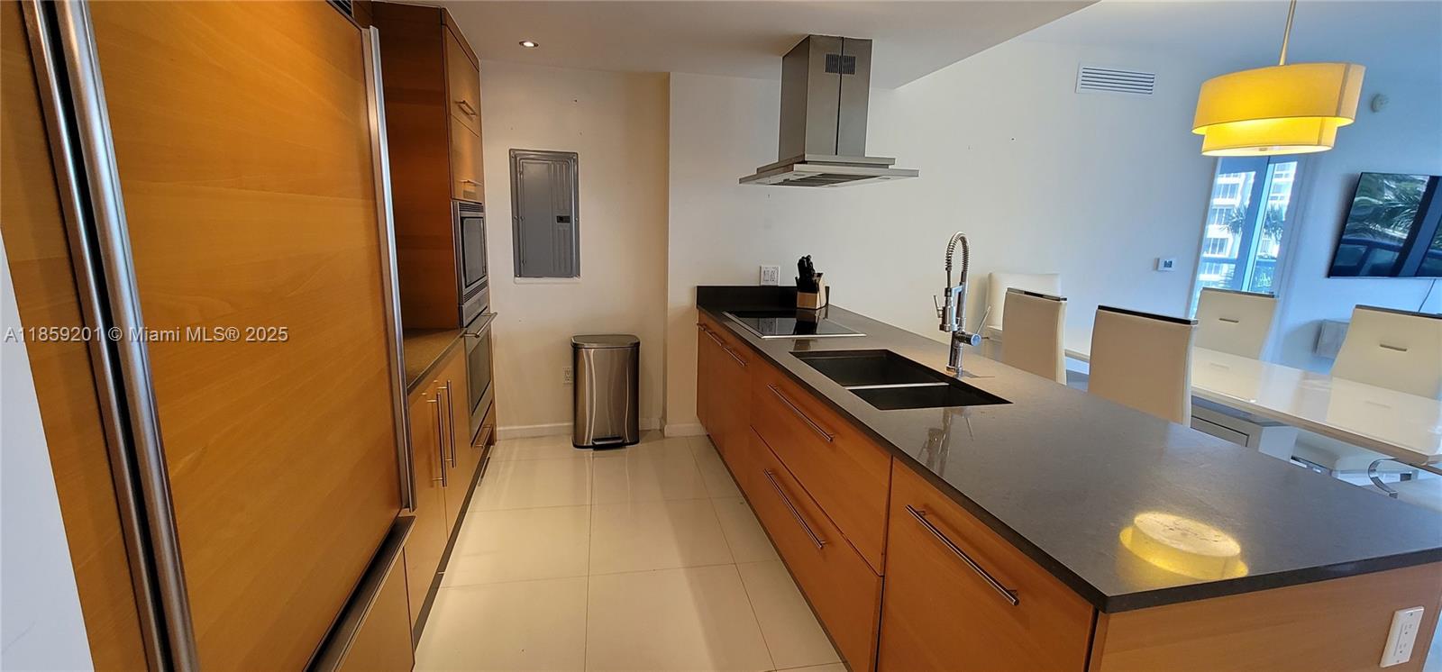 495 Brickell Avenue, Unit 420 Miami, FL 33131 - Photo 14 of 73 a kitchen with stainless steel appliances granite countertop a refrigerator a stove and a sink