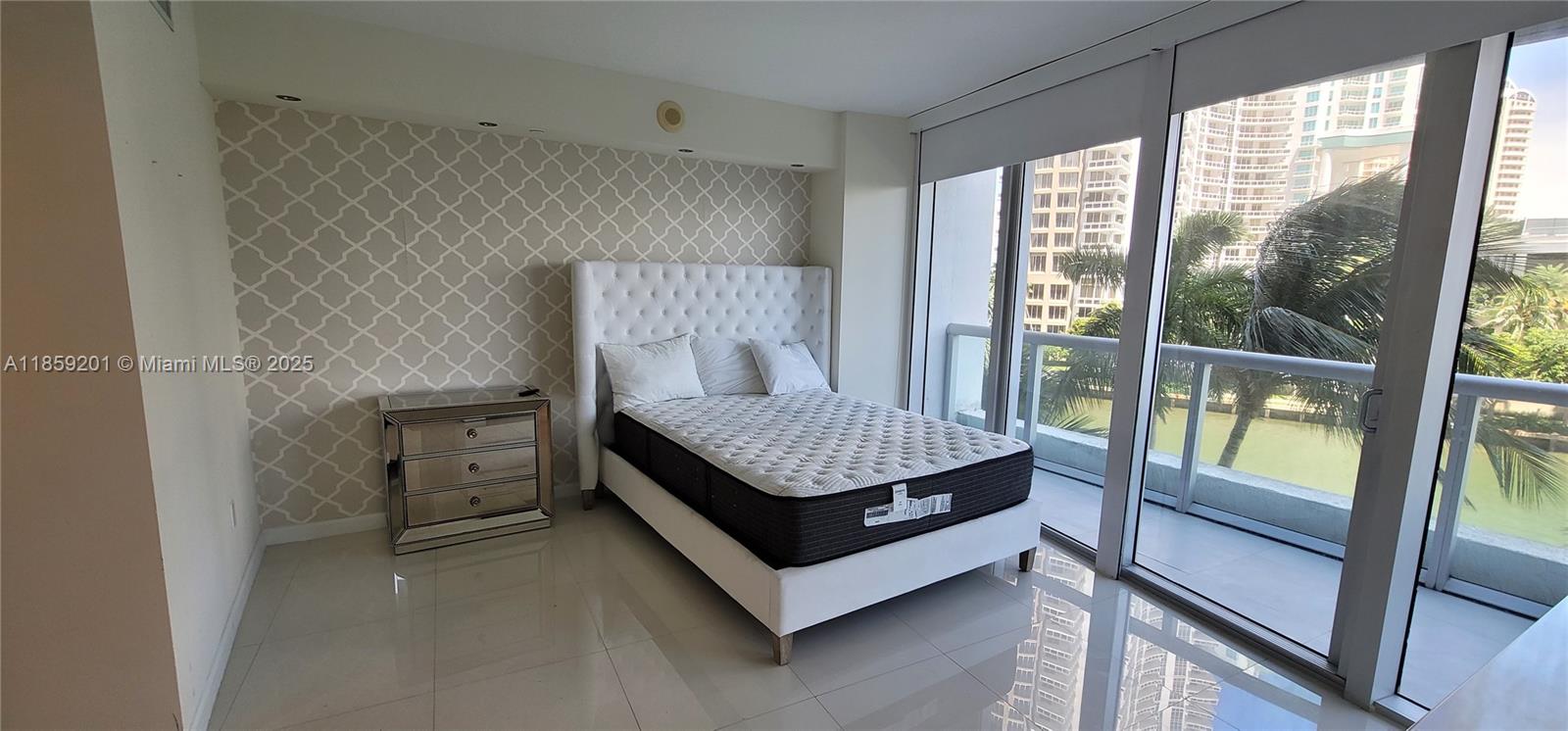 495 Brickell Avenue, Unit 420 Miami, FL 33131 - Photo 30 of 73 a living room with furniture and a gate