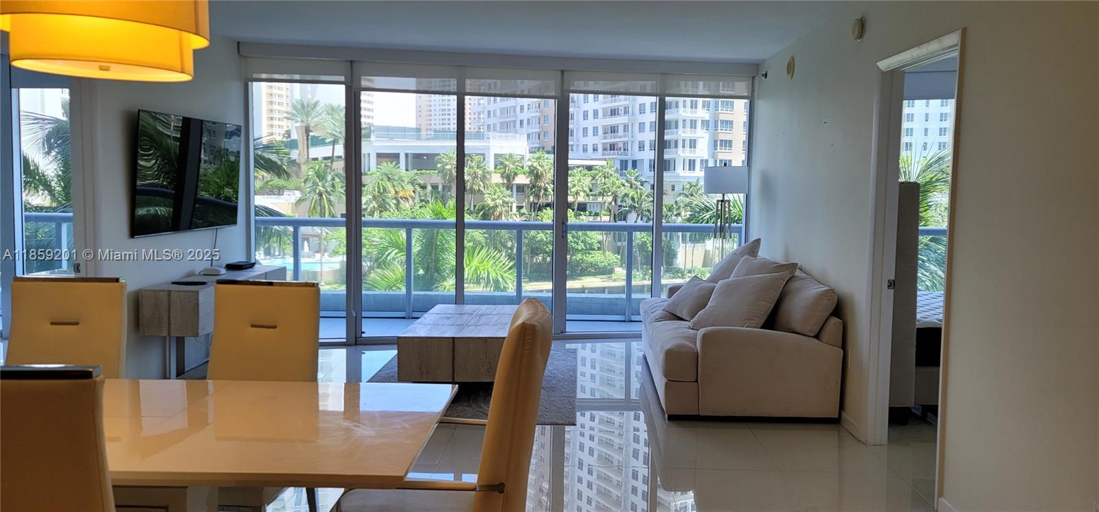 495 Brickell Avenue, Unit 420 Miami, FL 33131 - Photo 4 of 73 a living room with furniture and a window