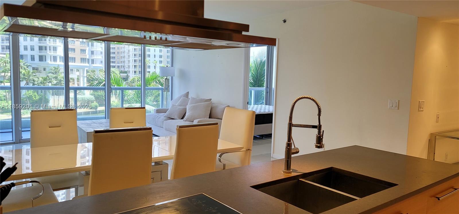 495 Brickell Avenue, Unit 420 Miami, FL 33131 - Photo 7 of 73 a living room with furniture and large window