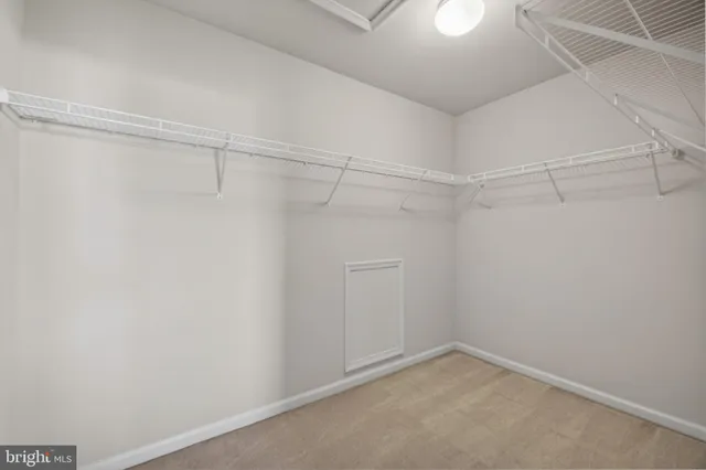 a view of a swimming pool with an outdoor seating