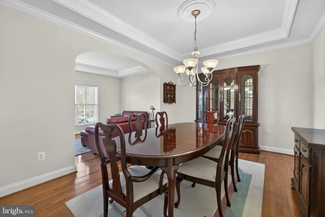 a living room with furniture fireplace and flat screen tv
