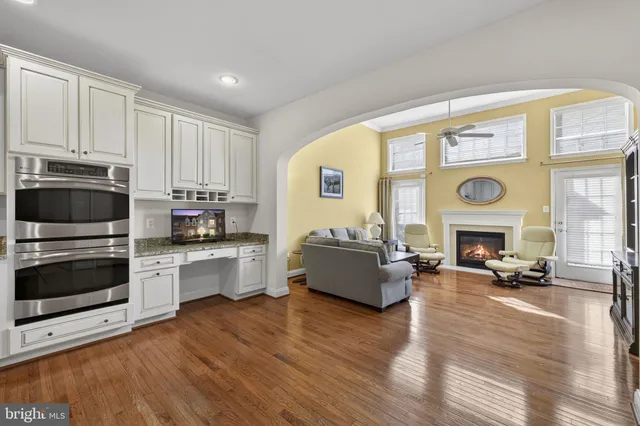 a bedroom with two beds and painted walls