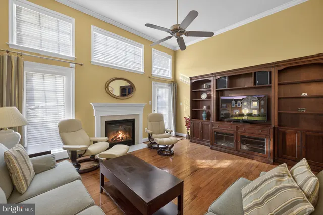 a bedroom with a bed couch and window