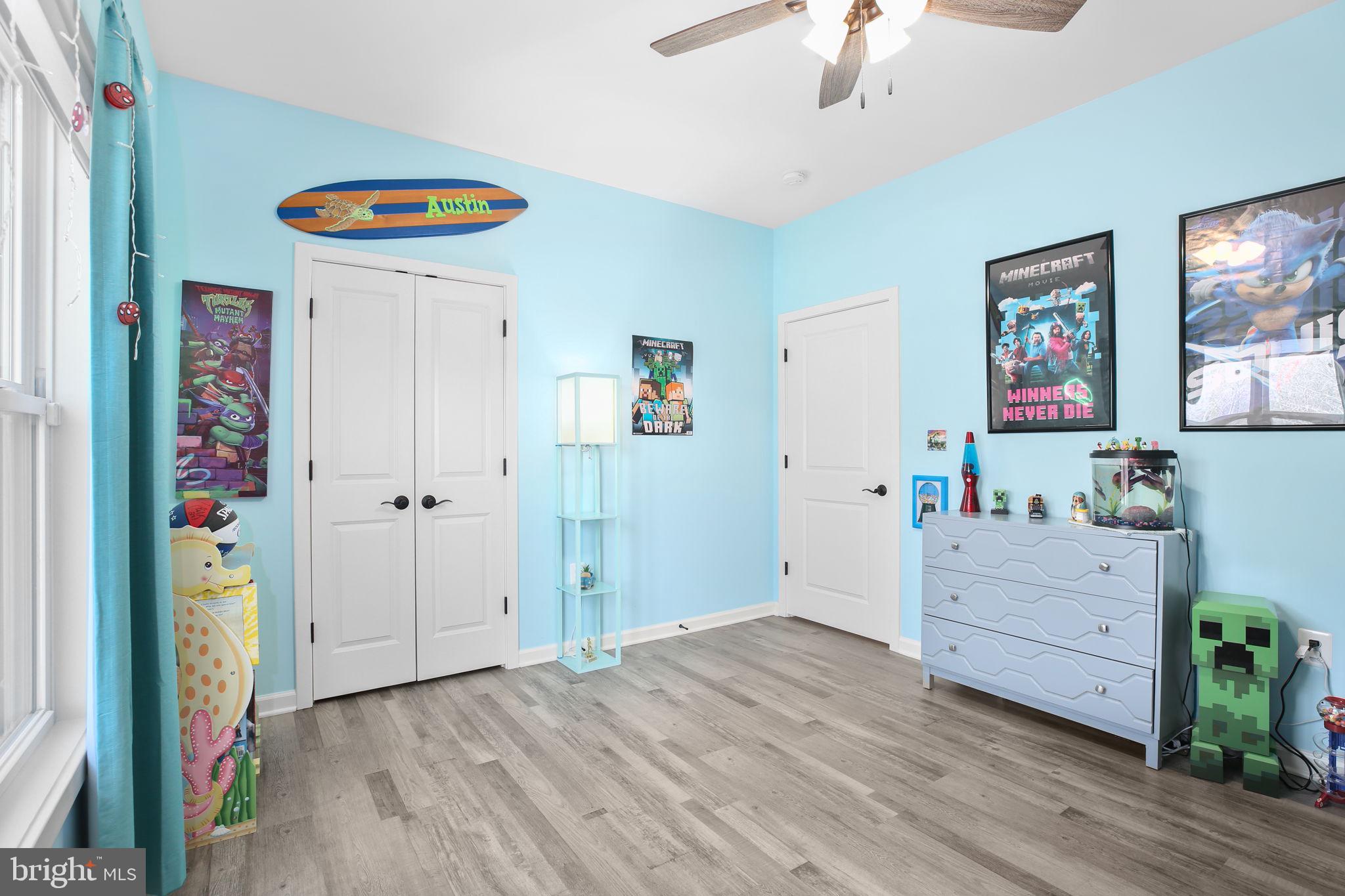9564 Blackbird Loop Culpeper, VA 22701 - Photo 22 of 52 wooden floor in an empty room with a window