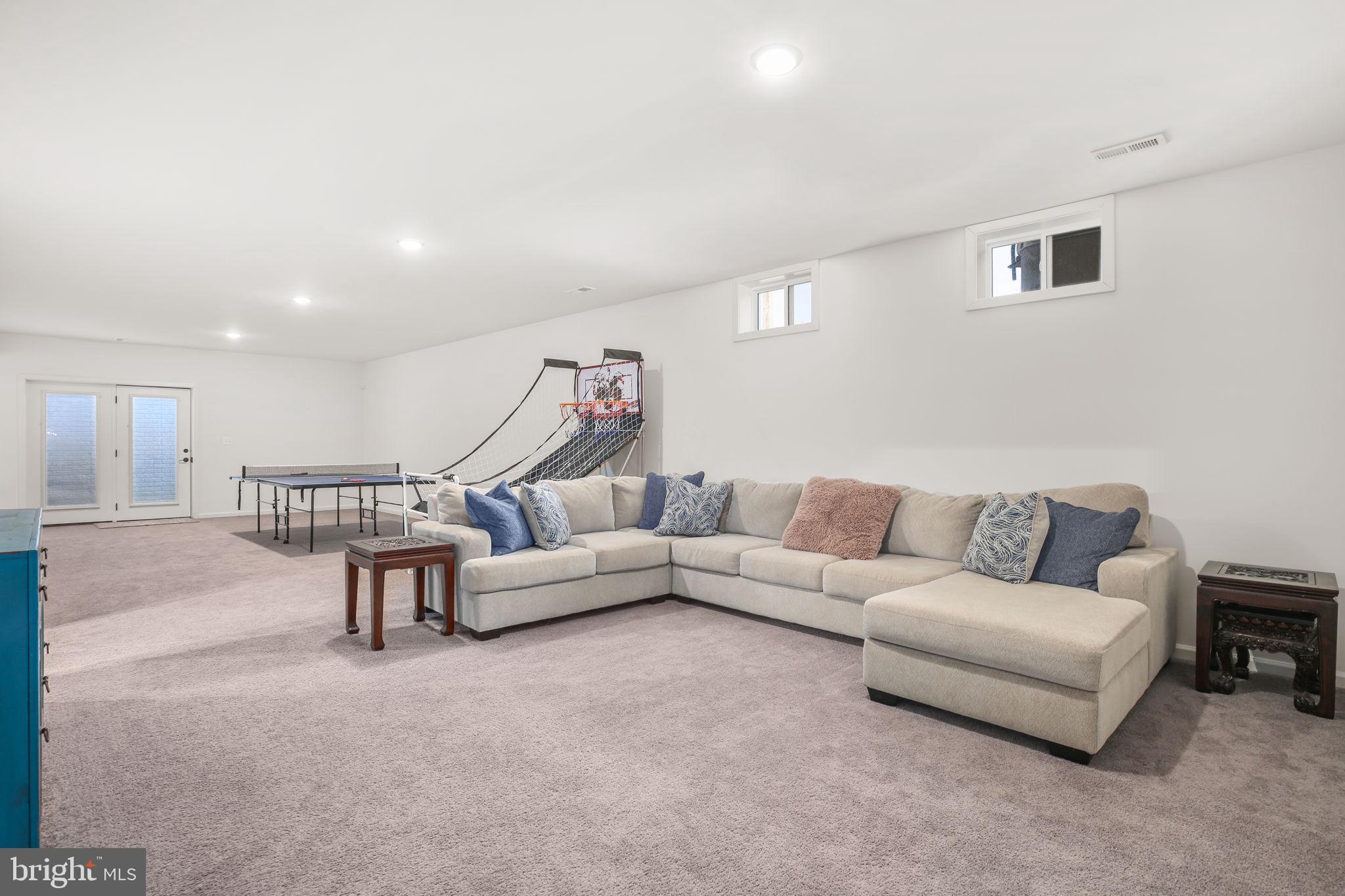 9564 Blackbird Loop Culpeper, VA 22701 - Photo 25 of 52 a living room with furniture and a couch