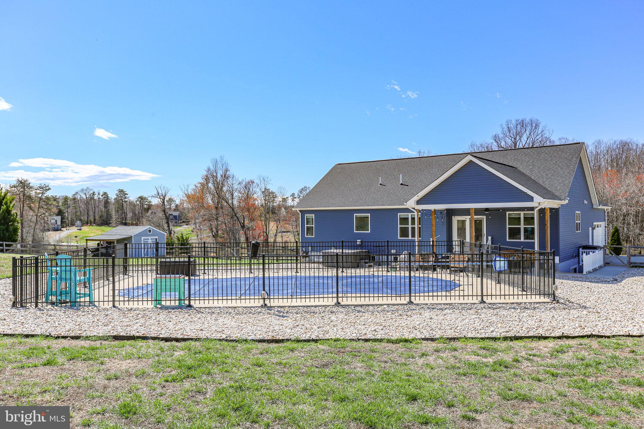 9564 Blackbird Loop Culpeper, VA 22701 - Photo 40 of 52 a front view of a house with a yard