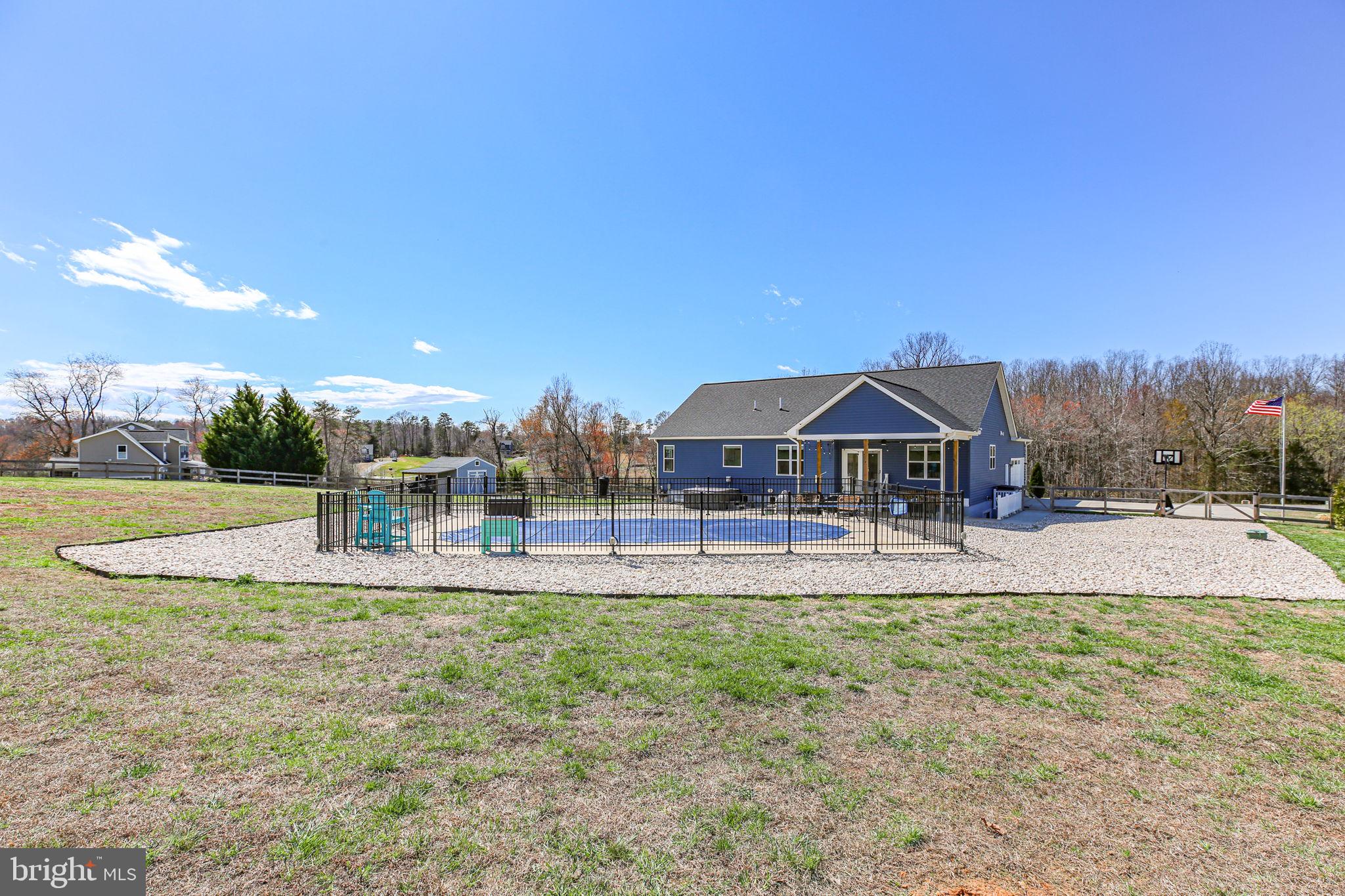 9564 Blackbird Loop Culpeper, VA 22701 - Photo 41 of 52 a view of a house with a yard and sitting area