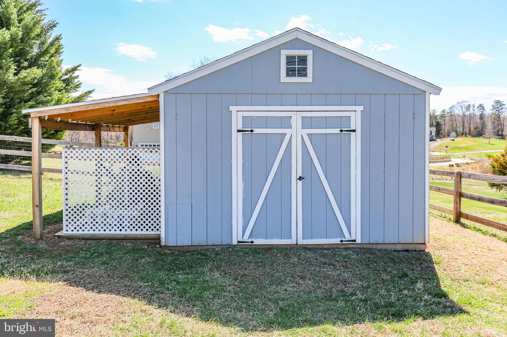 9564 Blackbird Loop Culpeper, VA 22701 - Photo 45 of 52 a front view of a house having yard