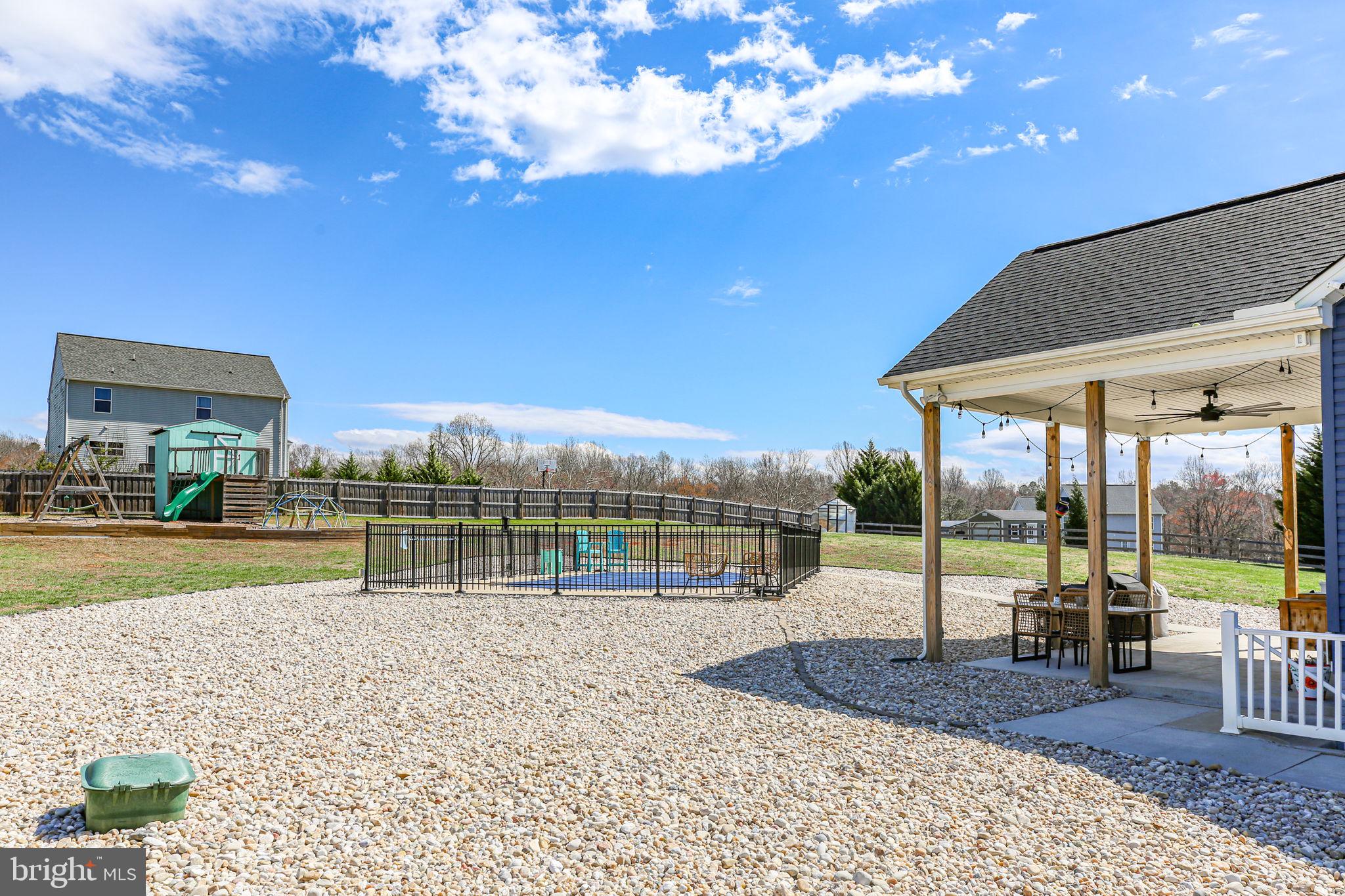 9564 Blackbird Loop Culpeper, VA 22701 - Photo 48 of 52 a view of a backyard