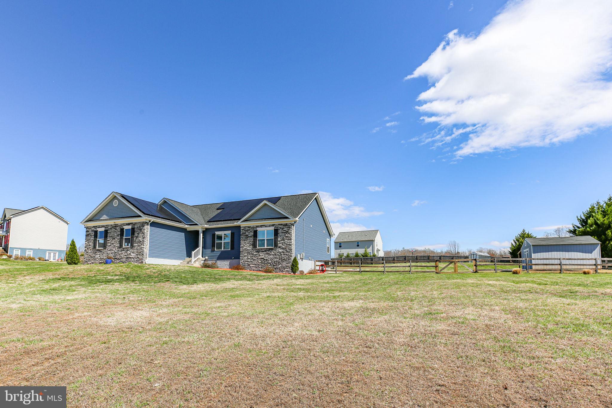 9564 Blackbird Loop Culpeper, VA 22701 - Photo 49 of 52 a view of a house with garden