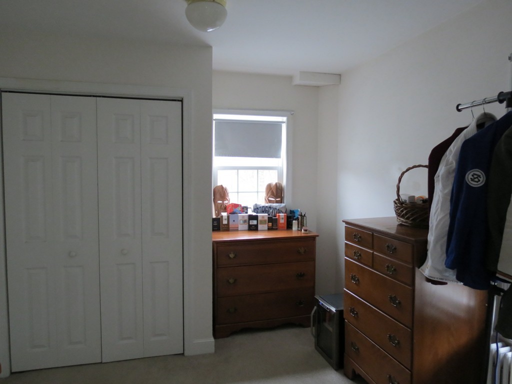 30 Harvard Road Shirley, MA 01464 - Photo 14 of 28 a room with a dresser and a window