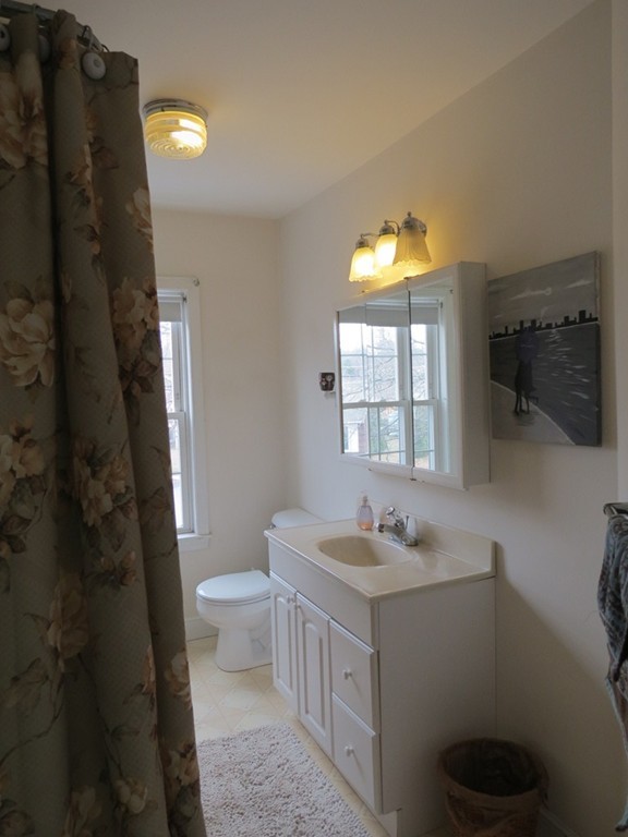30 Harvard Road Shirley, MA 01464 - Photo 15 of 28 a bathroom with a sink and a mirror