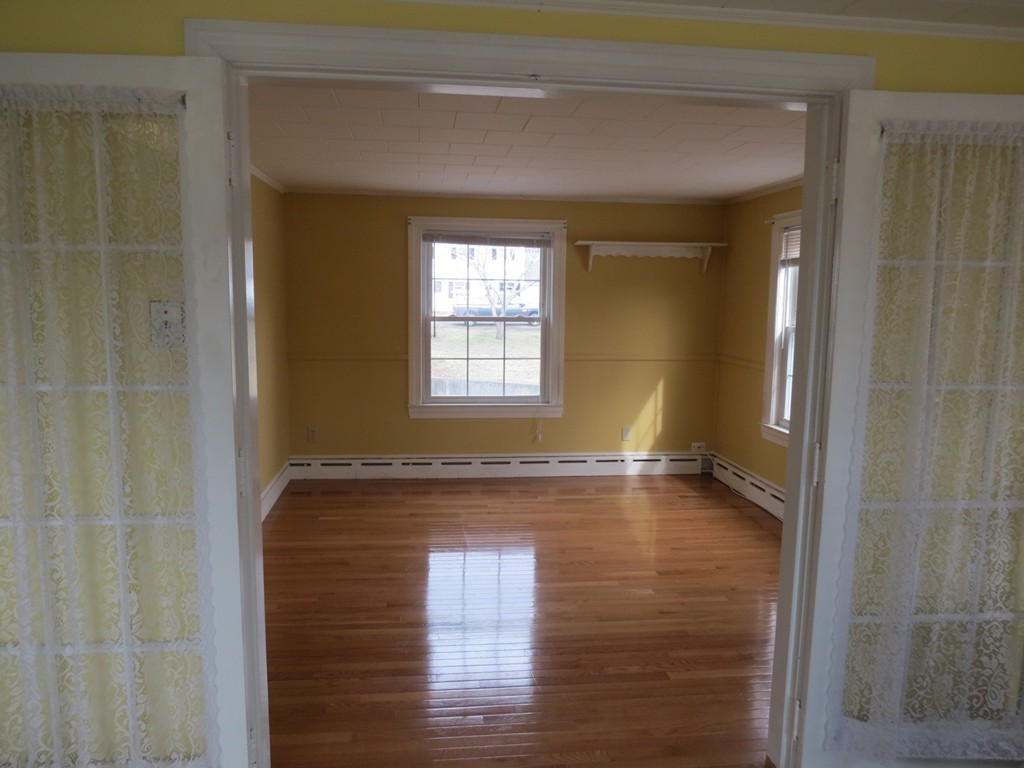 30 Harvard Road Shirley, MA 01464 - Photo 20 of 28 a view of empty room with window and hardwood floor