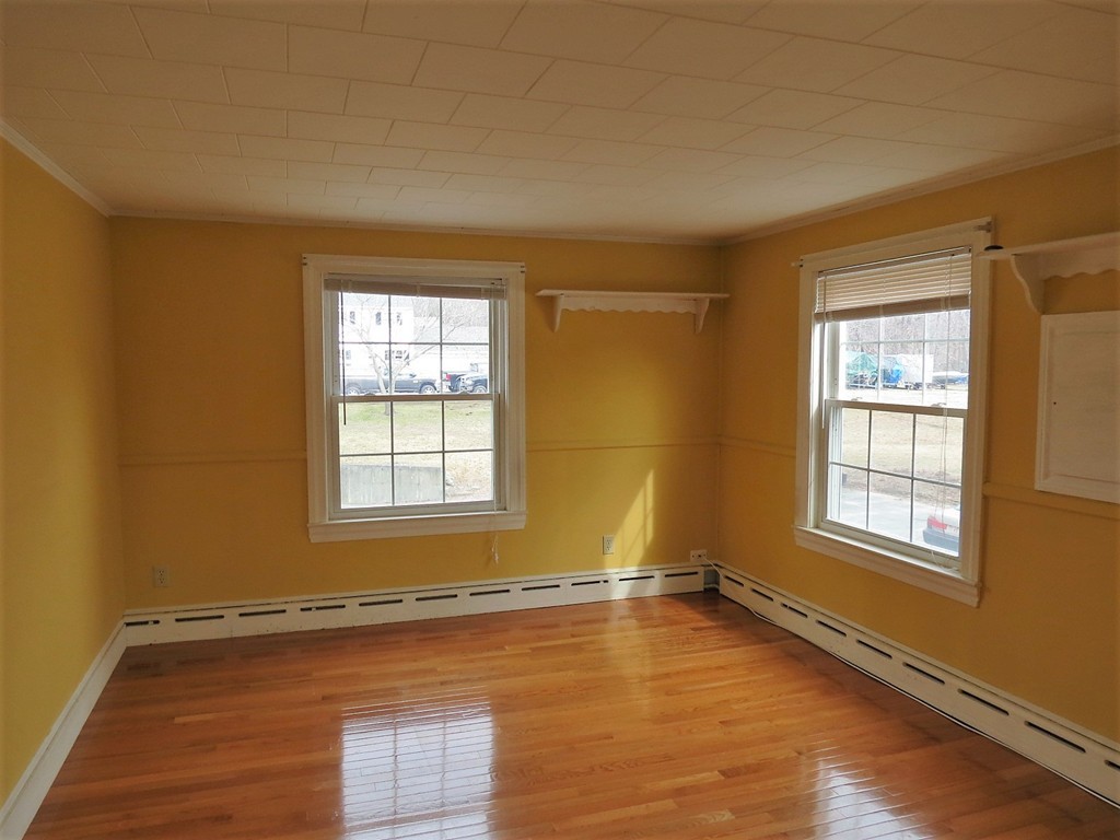 30 Harvard Road Shirley, MA 01464 - Photo 21 of 28 an empty room with wooden floor and windows