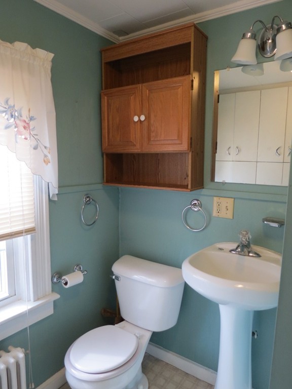 30 Harvard Road Shirley, MA 01464 - Photo 24 of 28 a bathroom with a sink mirror and toilet