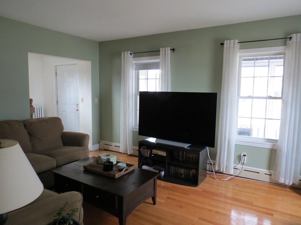 30 Harvard Road Shirley, MA 01464 - Photo 5 of 28 a living room with furniture and a flat screen tv