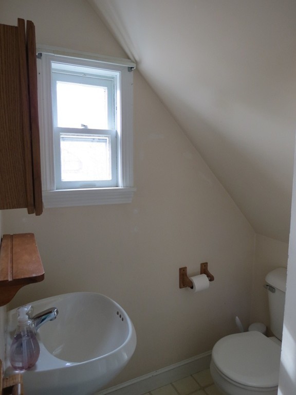 30 Harvard Road Shirley, MA 01464 - Photo 10 of 28 a white toilet sitting next to a window