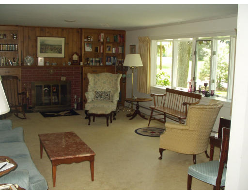 47 Jeffrey Road Wayland, MA 01778 - Photo 3 of 9 a living room with furniture and a fireplace