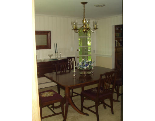 47 Jeffrey Road Wayland, MA 01778 - Photo 5 of 9 a view of a dining room with a table and chairs