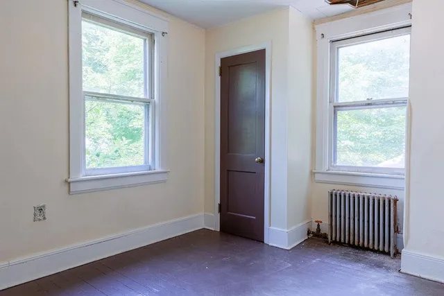 an empty room that has a window