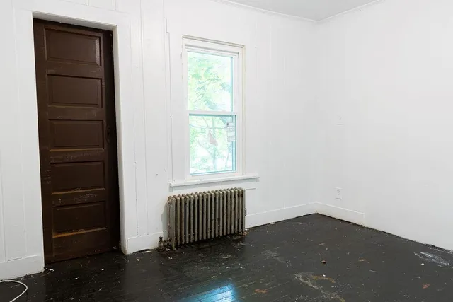 an empty room with windows