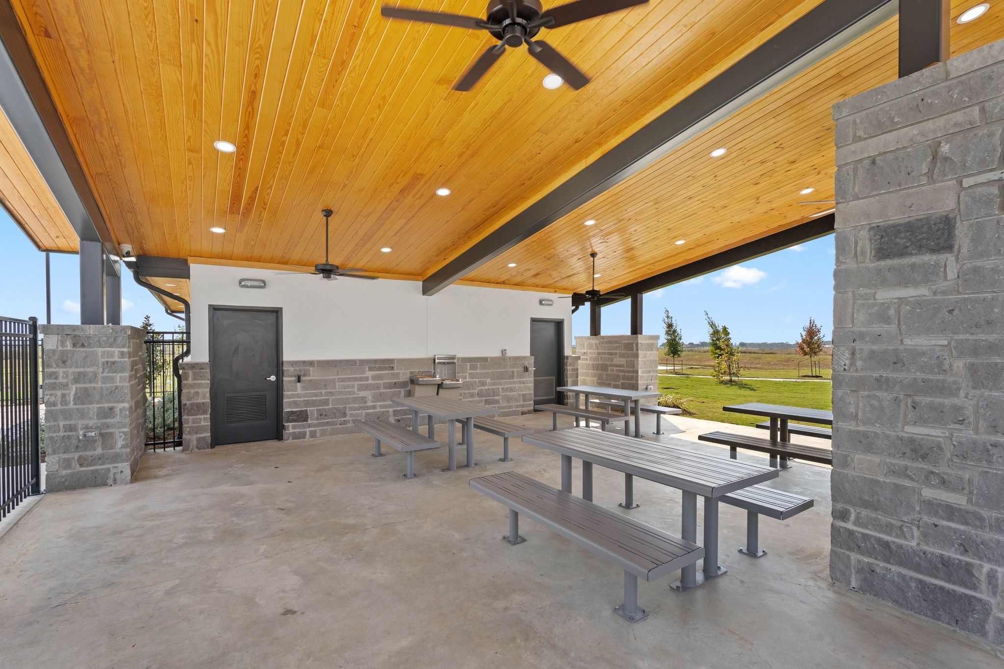 211 Homestead Court Dayton, TX 77535 - Photo 17 of 21 a view of a patio with a table and chairs