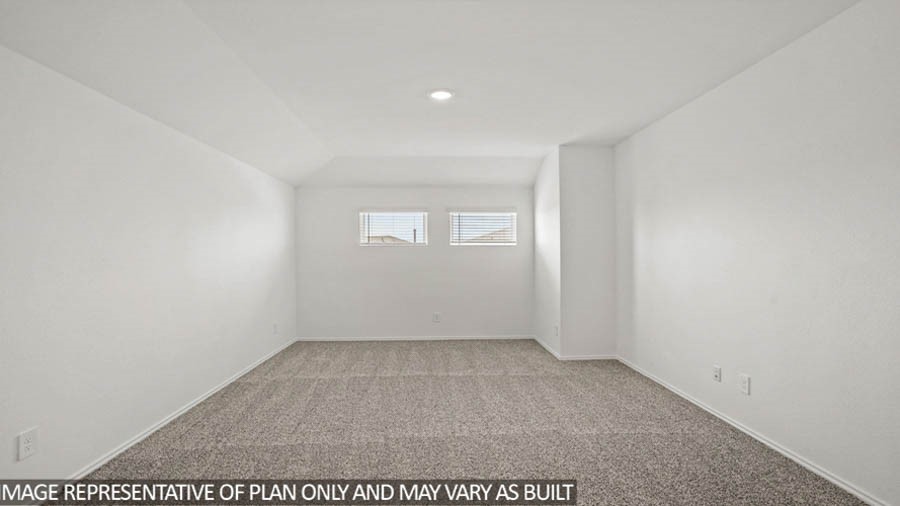 211 Homestead Court Dayton, TX 77535 - Photo 9 of 21 an empty room with a workbench