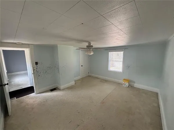 an empty room with windows