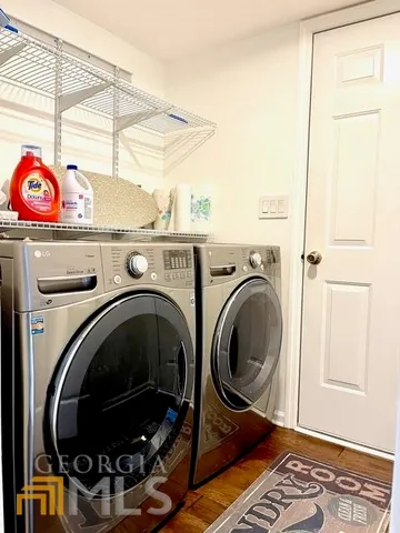 a view of deck with wooden floor and outdoor seating