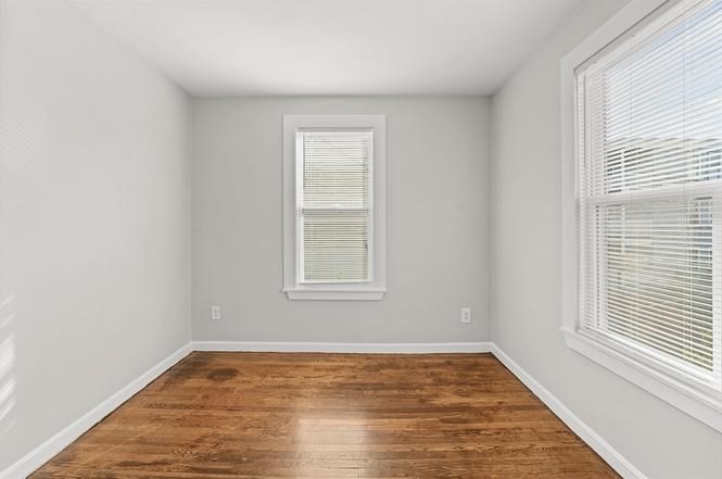 40 Ripley Road, Unit 2 Boston, MA 02121 - Photo 25 of 25 a view of empty room with wooden floor