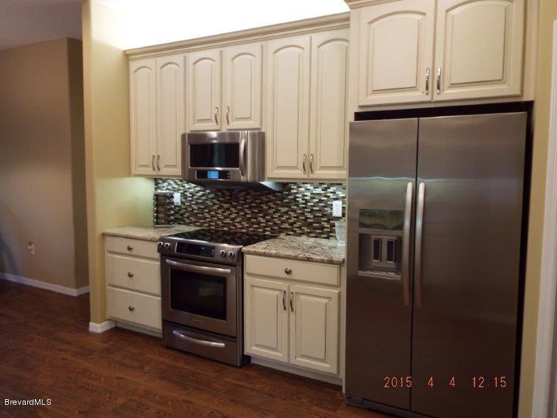 3900 Grant Line Road Mims, FL 32754 - Photo 11 of 36 Kitchen Cook Side.jpg