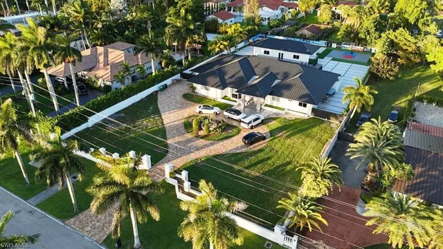 a view of swimming pool with a yard