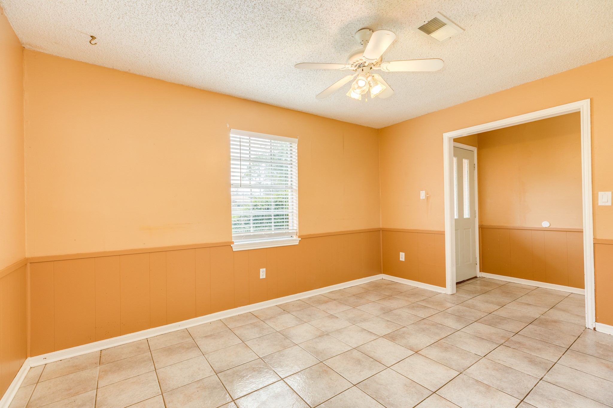 1030 Maple Street Clute, TX 77531 - Photo 13 of 25 a view of an empty room with a window