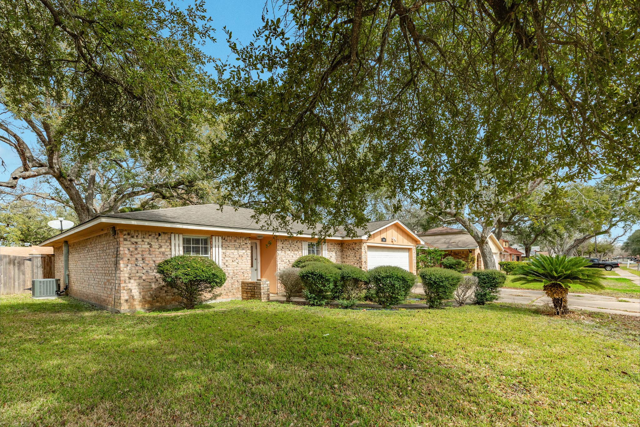 1030 Maple Street Clute, TX 77531 - Photo 3 of 25 a house view with a garden space