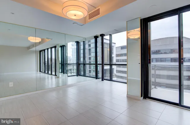 a view of roof with sitting area and furniture